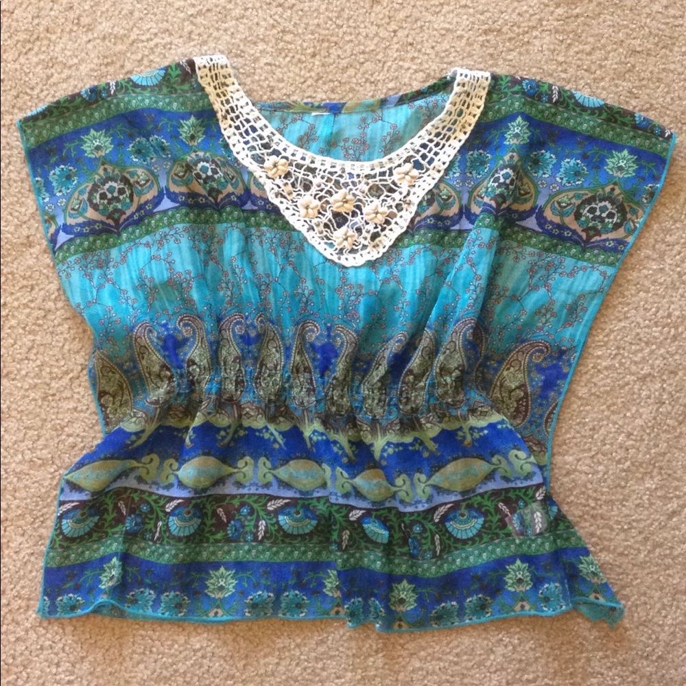 Girls blouse with crocheted neckline